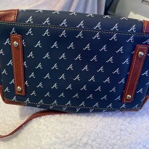 Atlanta Braves Dooney & Bourke purse. Is a reposh, gently used for two seasons.